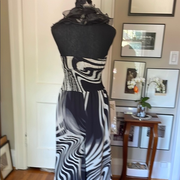 Elegant Black and White Halter-Top Jumpsuit with Ruffled Detail - Picture 8 of 16